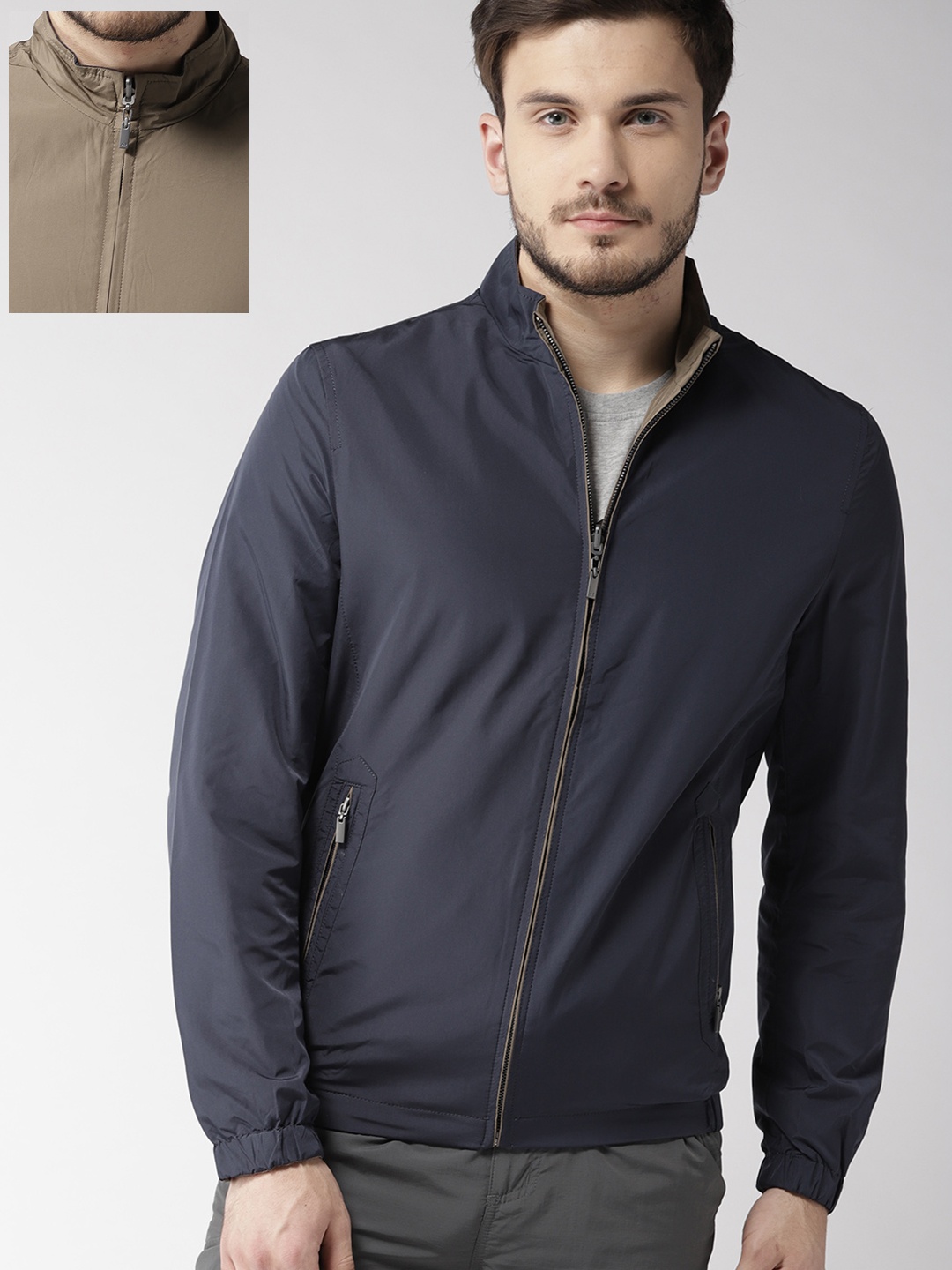 

Arrow Sport Men Navy Blue Solid Reversible Sporty Jacket