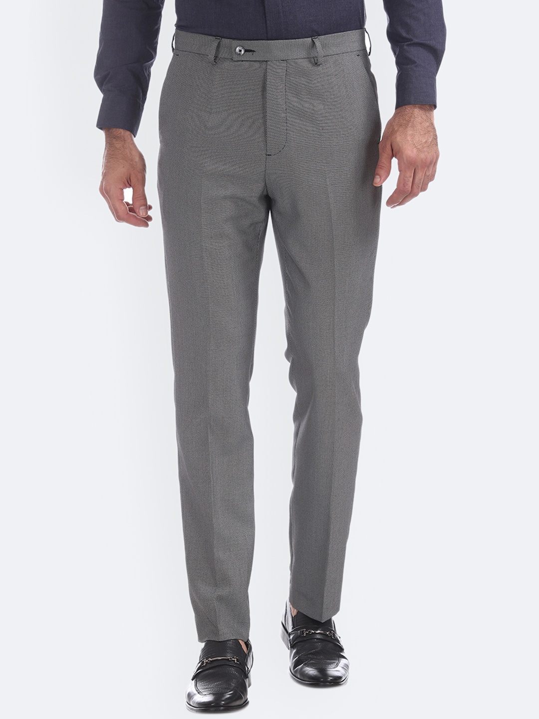 

Arrow New York Men Black & Off-White Tapered Fit Self Design Formal Trousers
