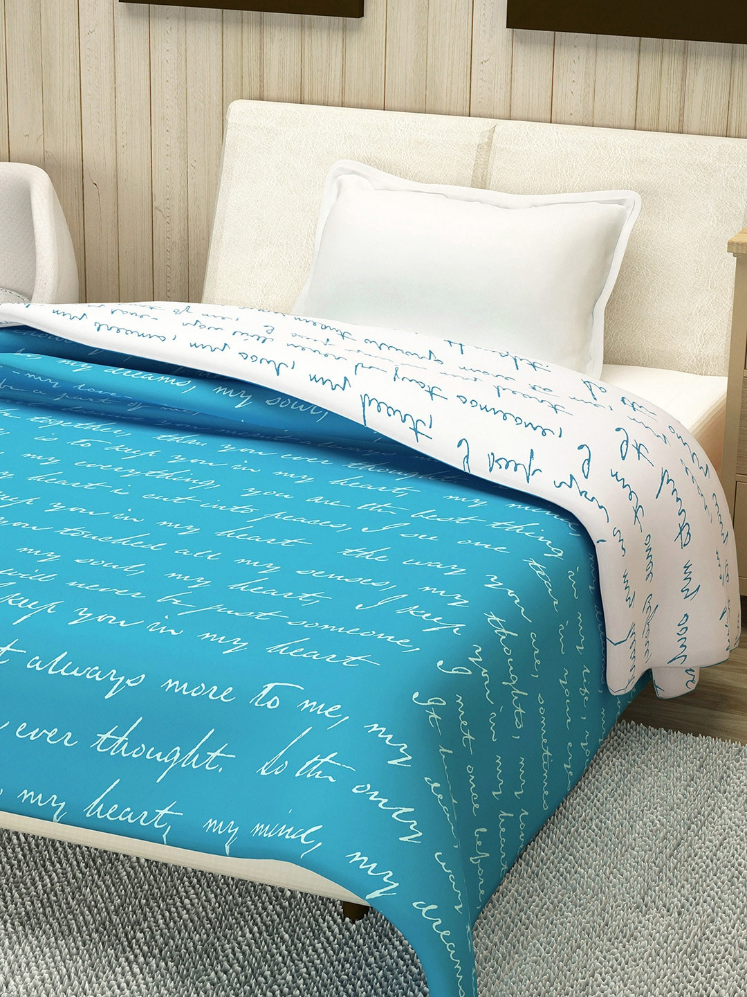 

Divine Casa Turquoise Blue Abstract AC Room 110 GSM Single Bed Dohar
