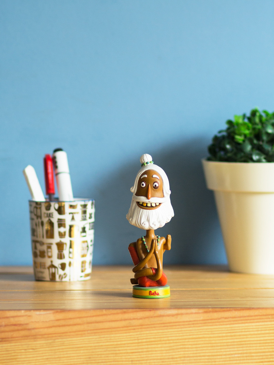 

Chumbak Brown & White Yogi Baba Bobblehead Showpiece