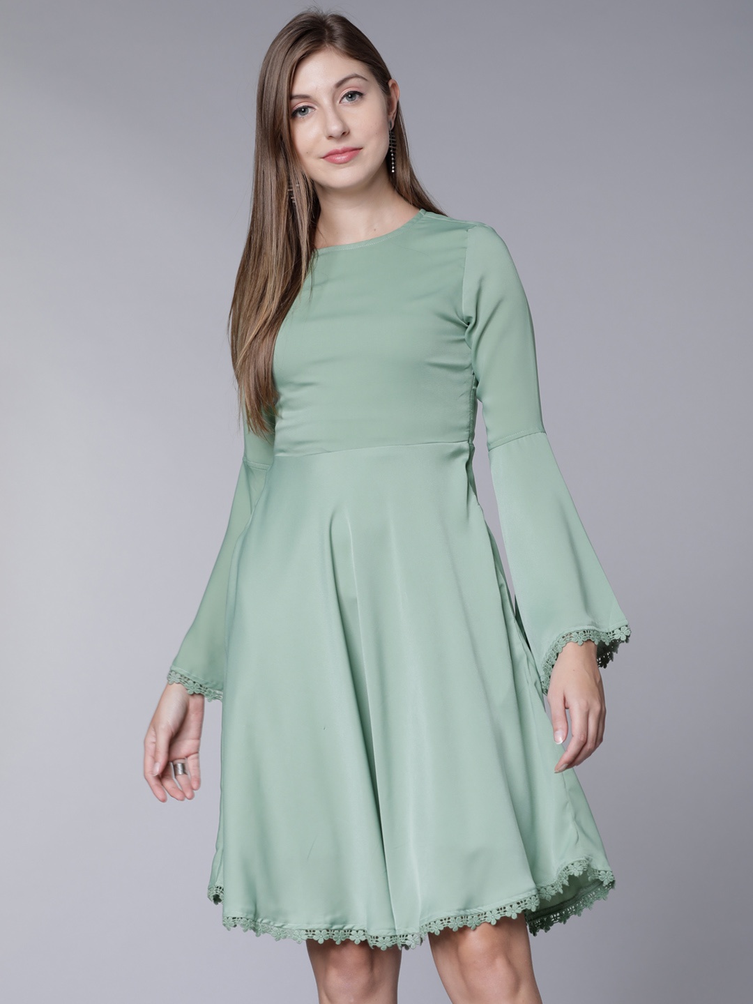 

Tokyo Talkies Women Green Solid Fit and Flare Dress