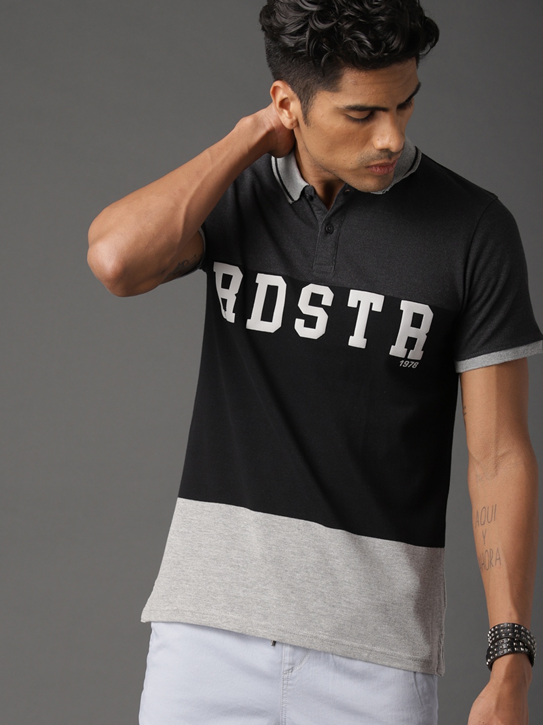 

Roadster Men Black & Grey Colourblocked Brand Carrier Polo T-shirt