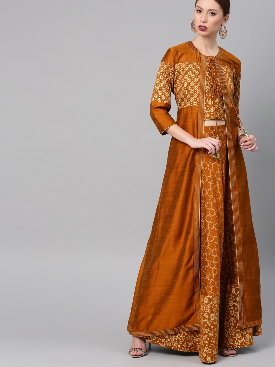 

Vishudh Women Rust & Gold-Toned Self Designed Skirt With Top & Jacket