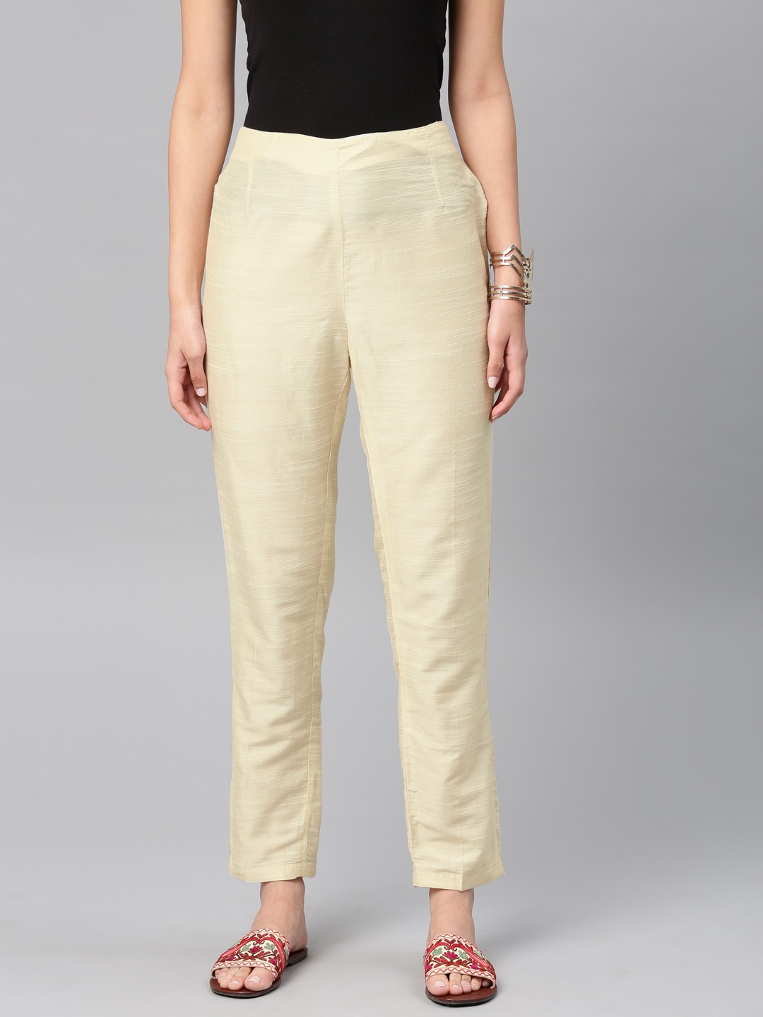 

Vishudh Women Cream-Coloured Regular Fit Solid Cropped Regular Trousers
