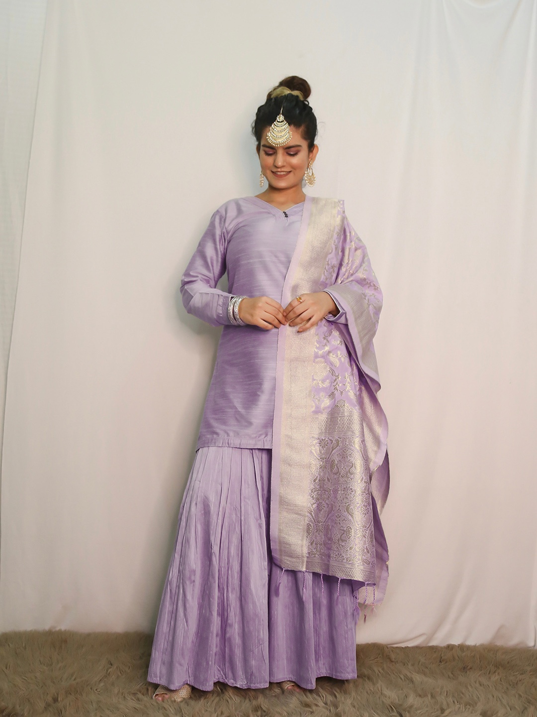 

Vishudh Women Mauve Regular Kurta with Sharara & With Dupatta