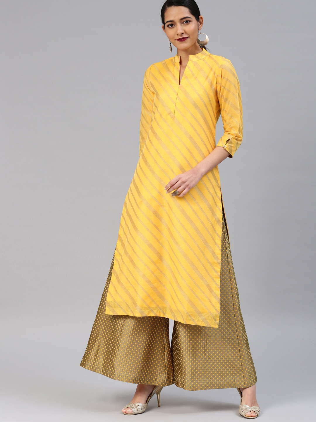 

Vishudh Women Yellow & Gold-Toned Self Design Kurta with Palazzos