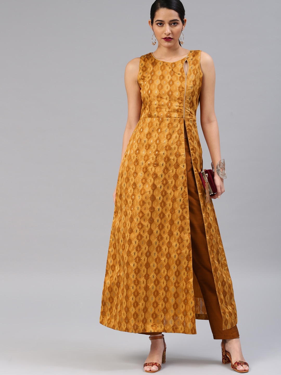 

Vishudh Women Mustard Printed Kurta with Trousers