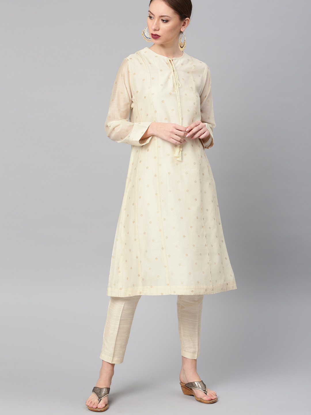 

Vishudh Women Cream-Coloured Self Design Kurta with Trousers