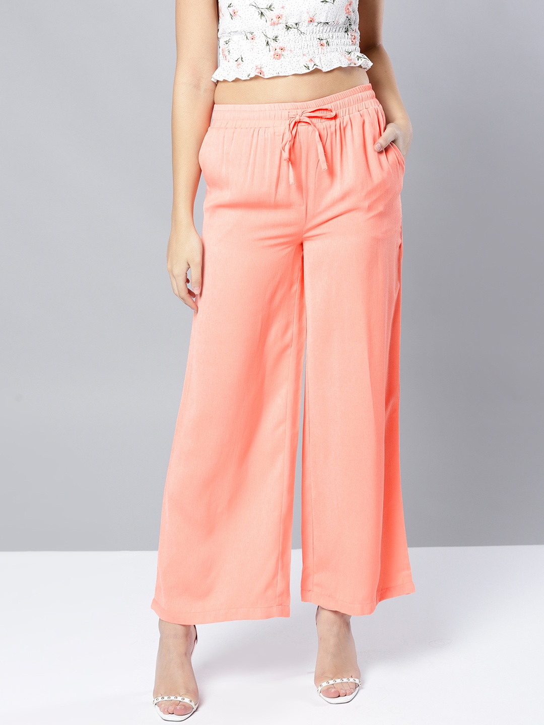 

Harpa Women Coral Pink Regular Fit Solid Parallel Trousers