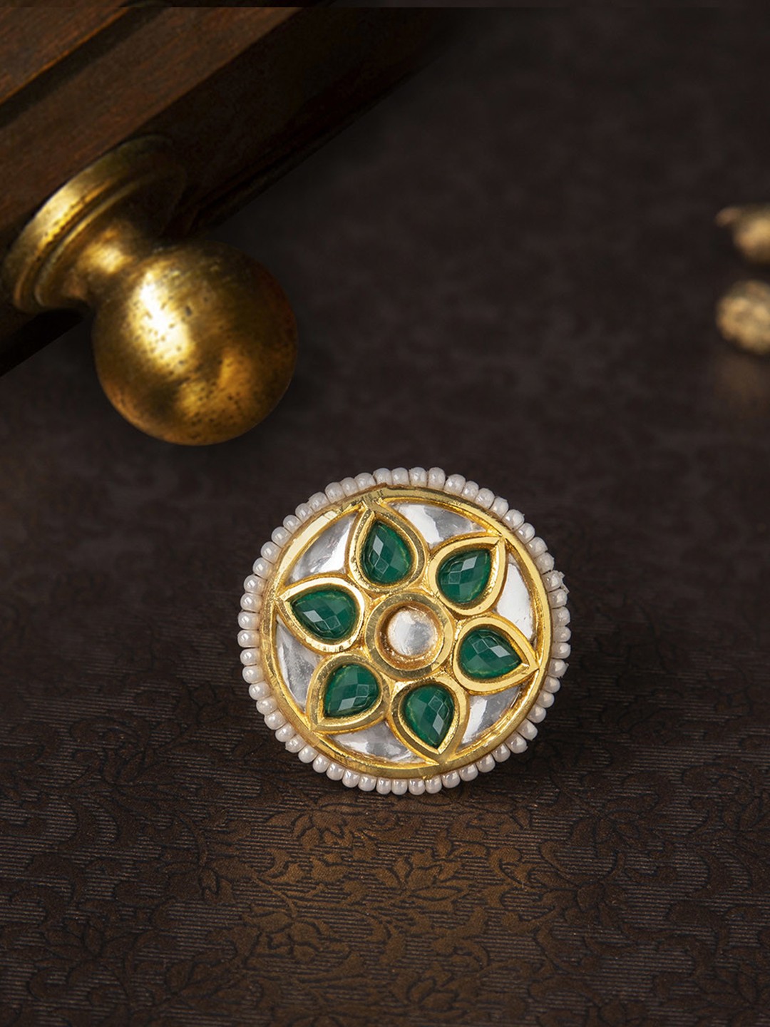 

Rubans Gold Plated Kundan Studded Embellished With Faux Emerald Traditional Cocktail Ring
