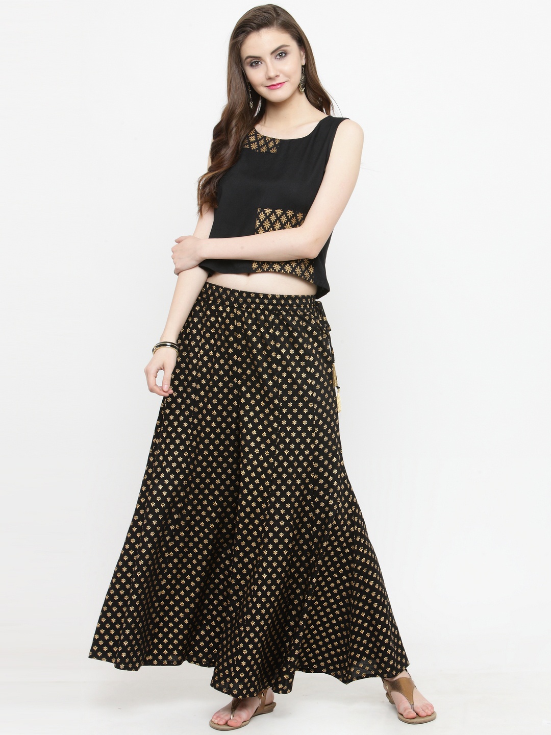 

Varanga Women Black & Gold-Toned Solid Top with Palazzos