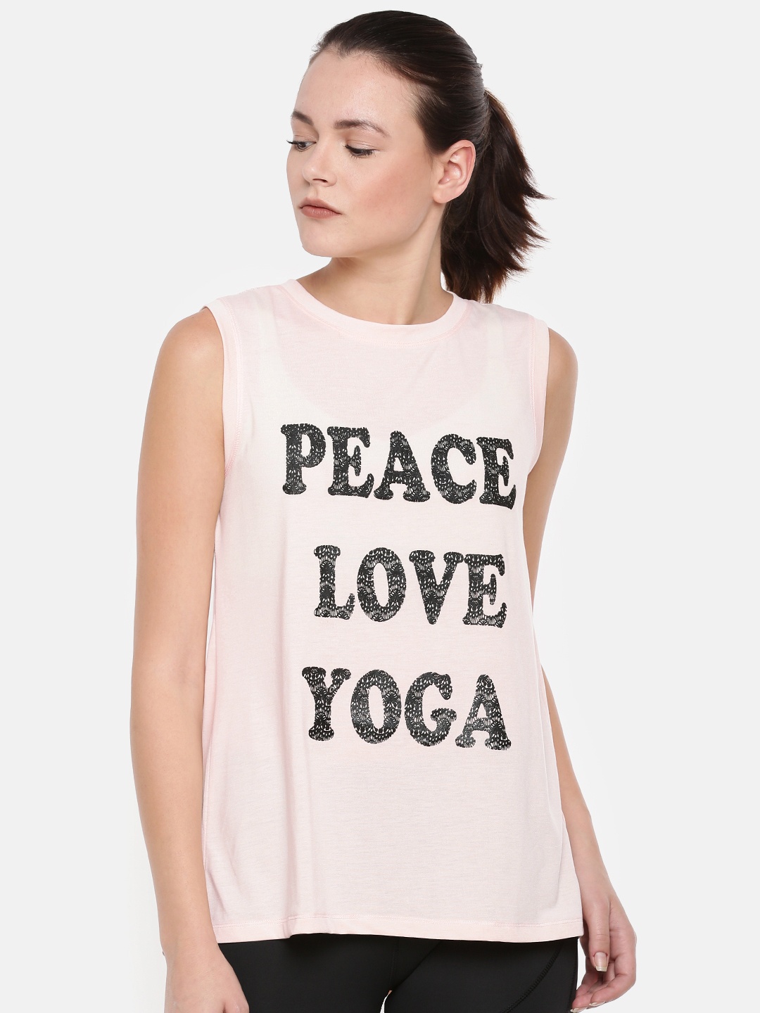 

Enamor Women Peach-Coloured Solid Styled Back Top