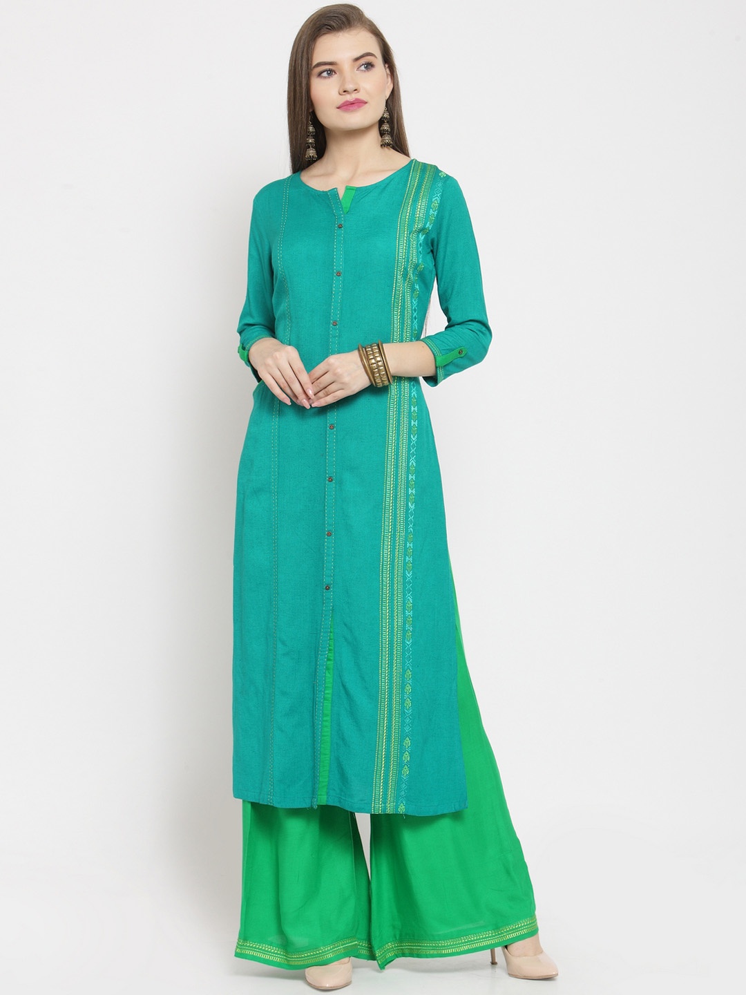 

Kvsfab Women Green Embroidered Regular Thread Work Raw Silk Kurta with Palazzos