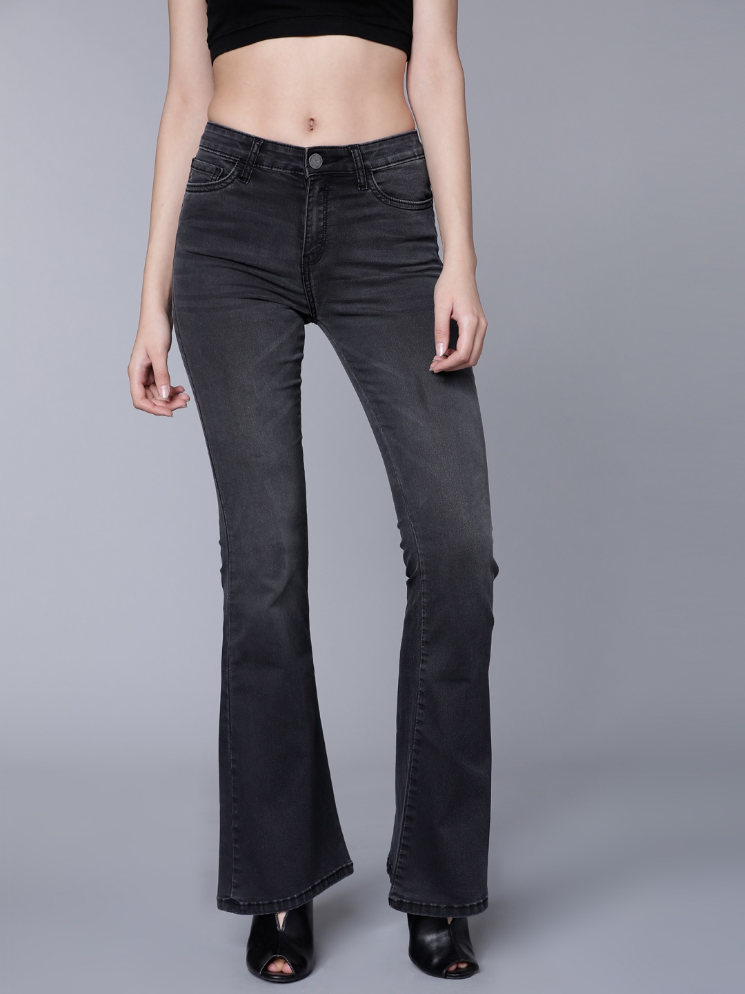 

Tokyo Talkies Women Black Flared Mid-Rise Clean Look Jeans