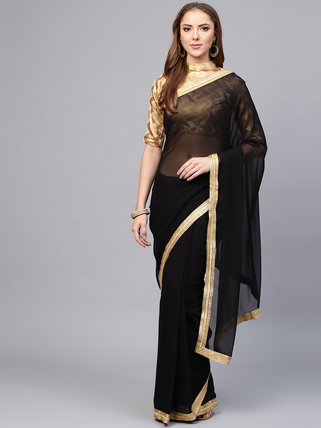 

Saree mall Black Solid Saree