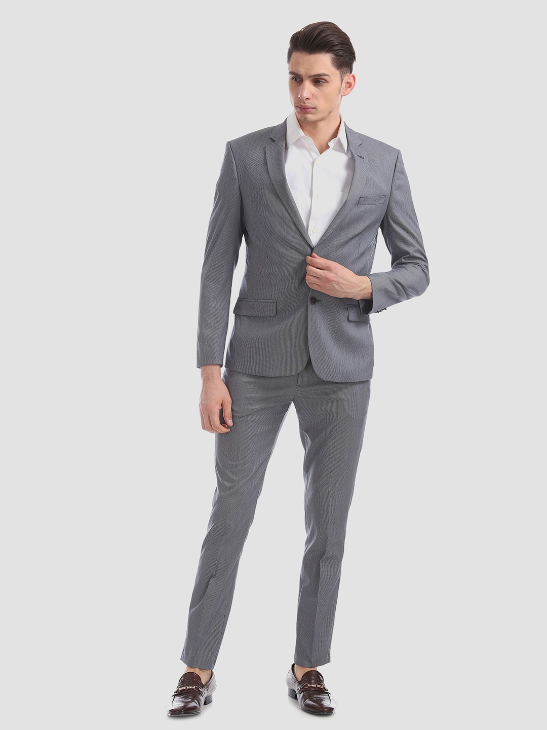 

Arrow New York Men Navy Blue & White Self Design Zero Calorie Fit Formal Suit