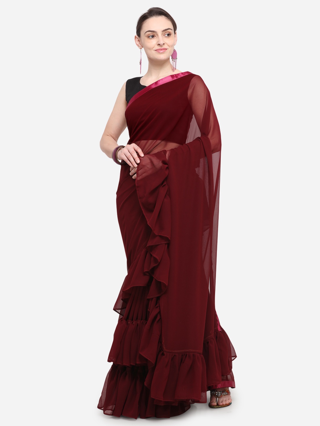 

Colors Maroon Solid Poly Georgette Saree