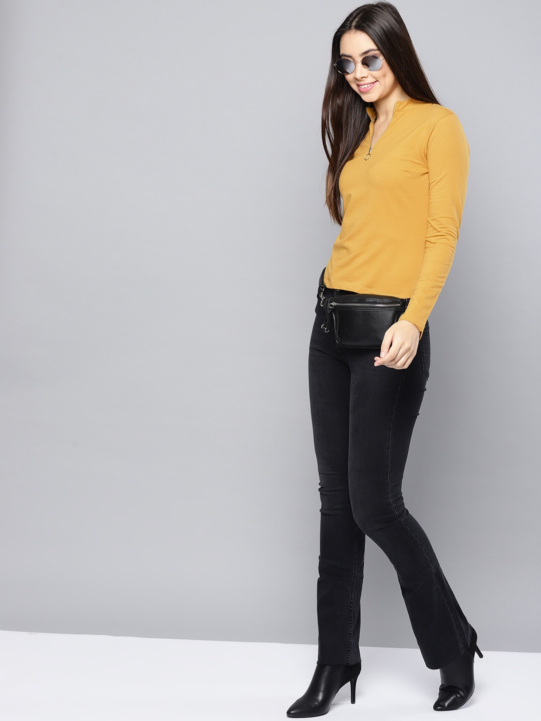 

Harpa Women Mustard Yellow Solid Sweatshirt