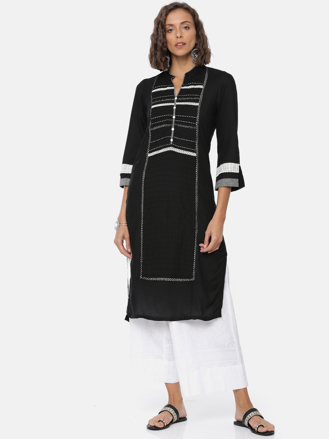 

Rangriti Women Black Solid A-Line Kurta