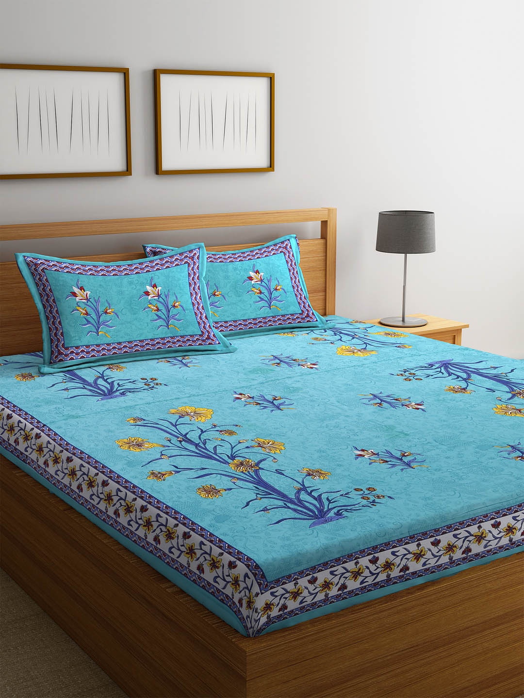 

Rajasthan Decor Blue & Yellow Floral Flat 144 TC Cotton Bedsheet with 2 Pillow Covers