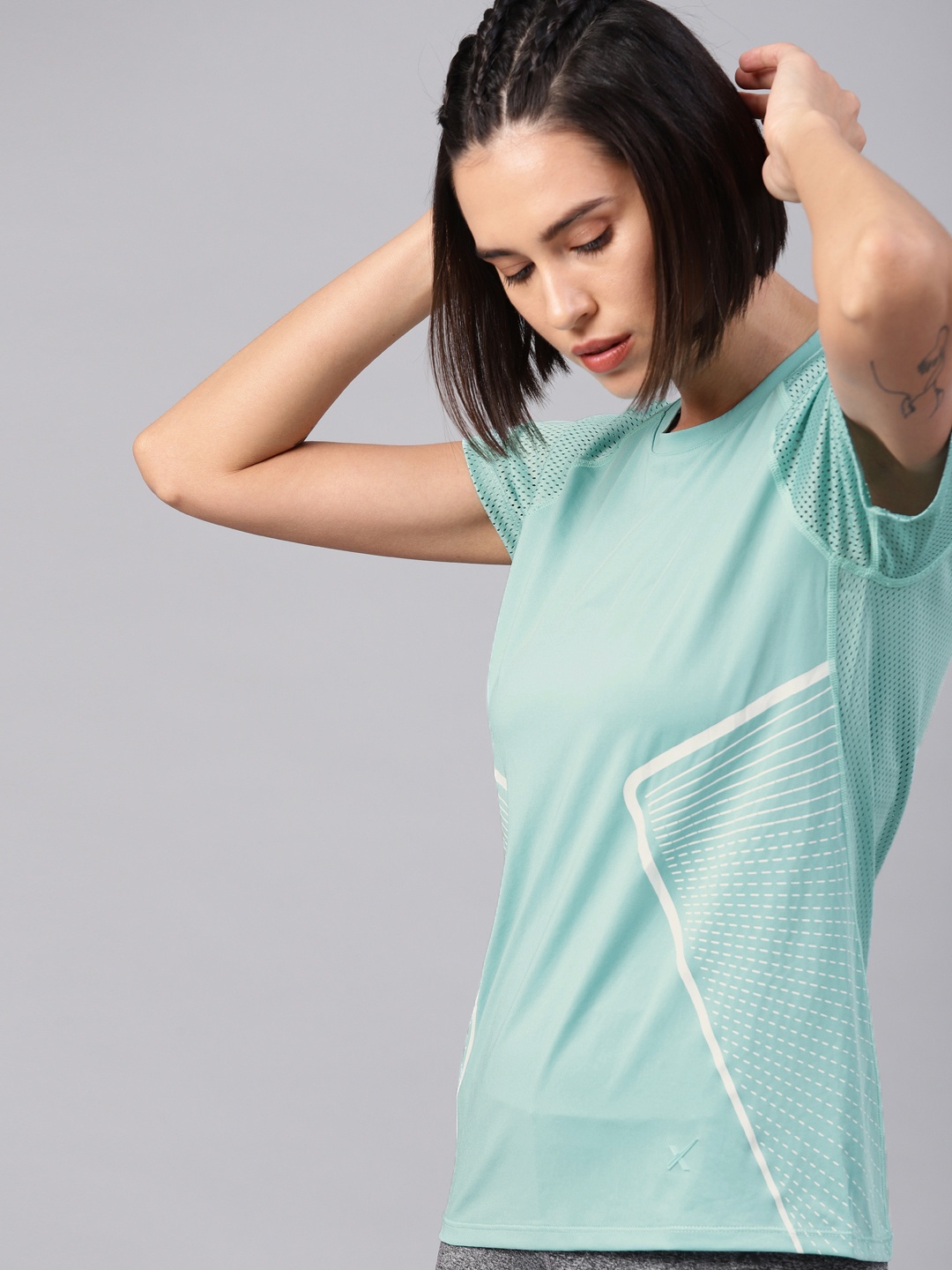 

HRX by Hrithik Roshan Women Turquoise Blue Solid Round Neck Running T-shirt