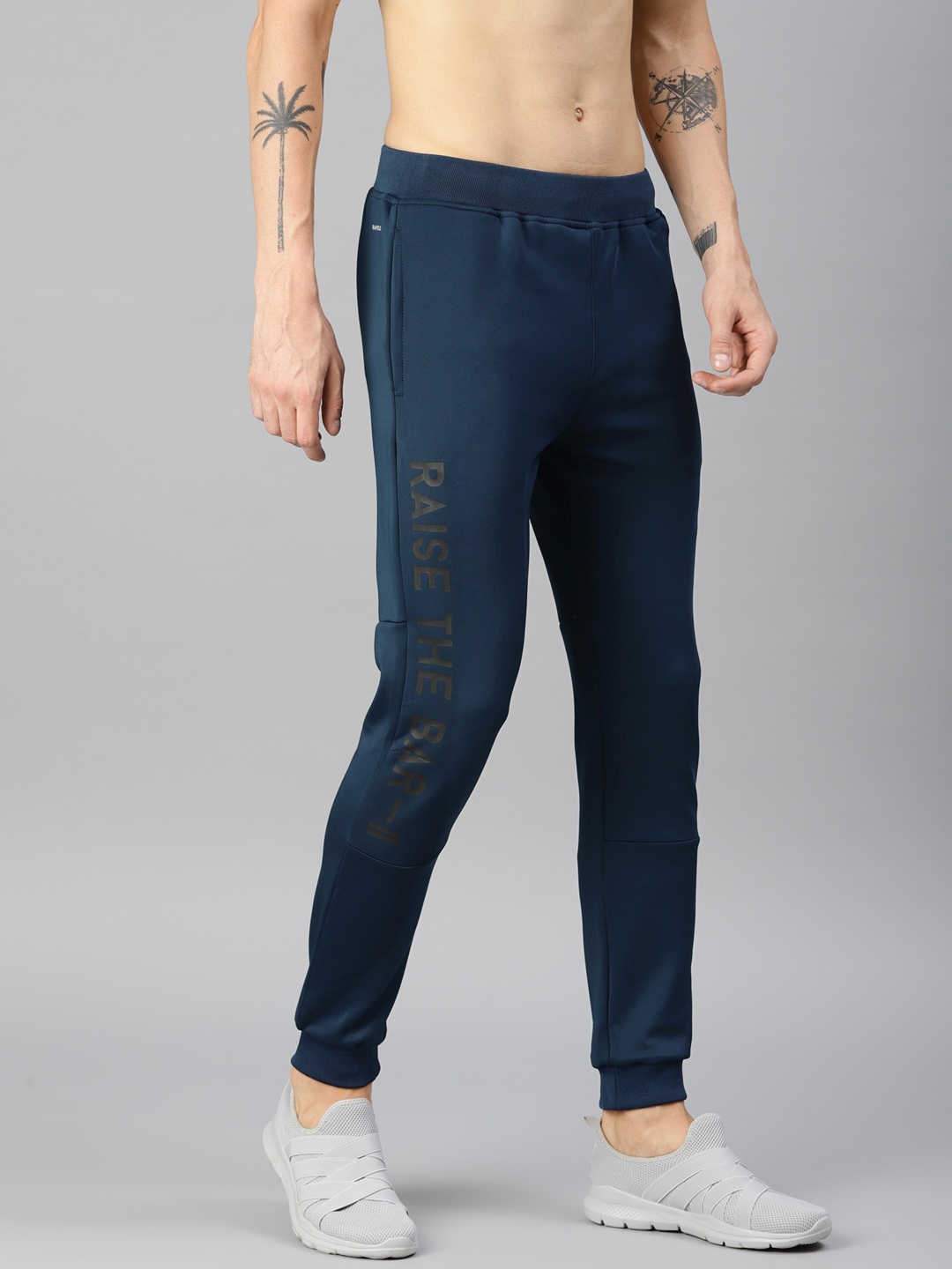 

HRX by Hrithik Roshan Men Solid Rapid-Dry Training Joggers, Teal