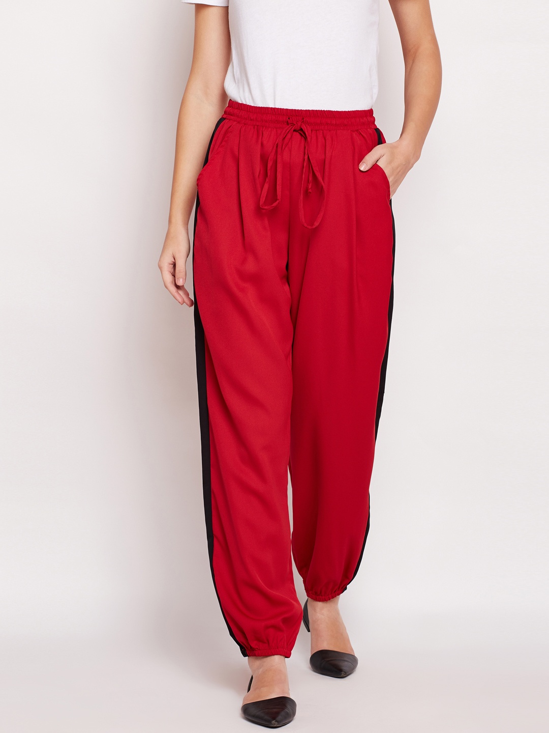 

Oxolloxo Women Red Regular Fit Solid Regular Trousers