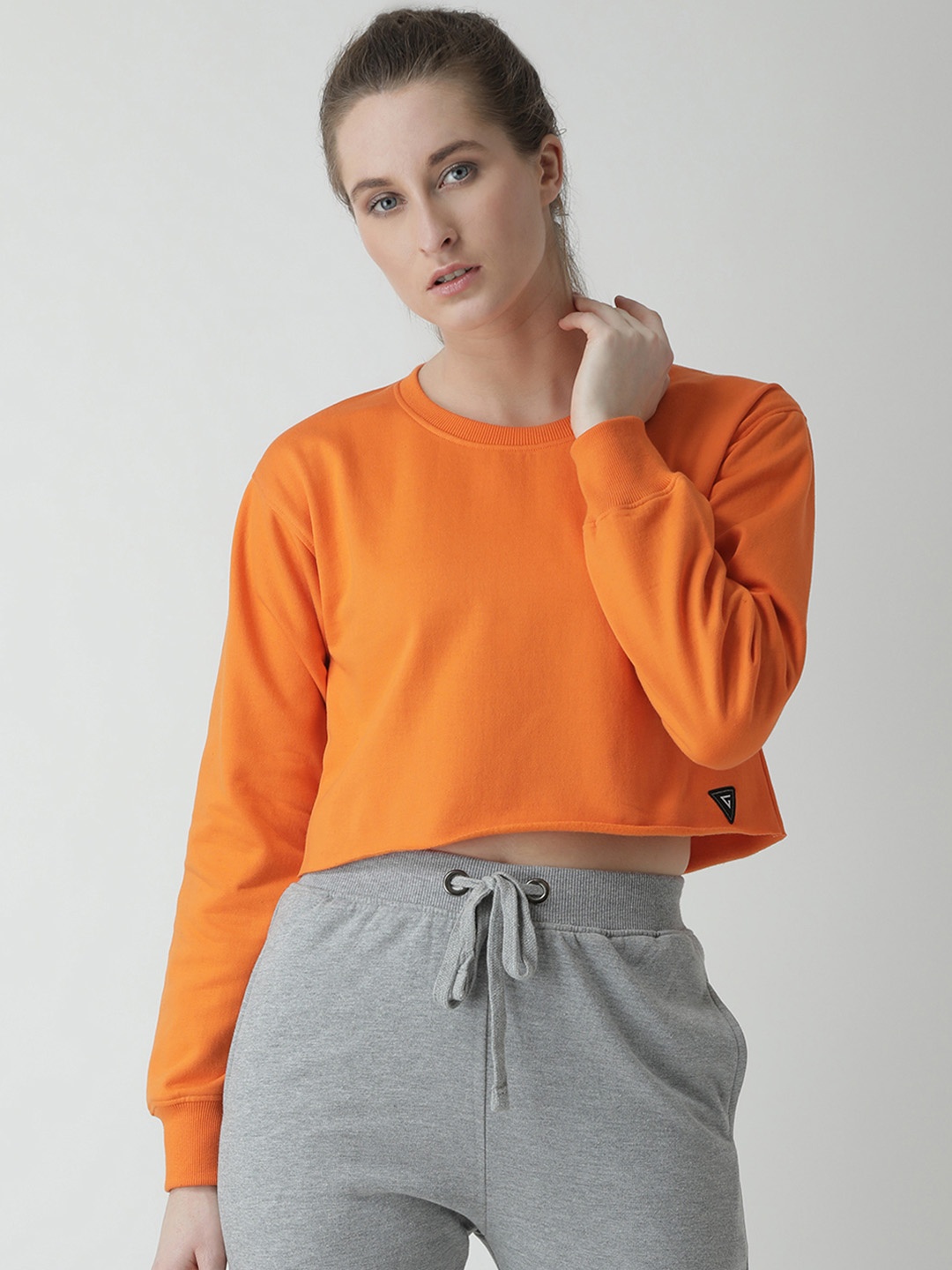

GRIFFEL Women Orange Solid Sweatshirt