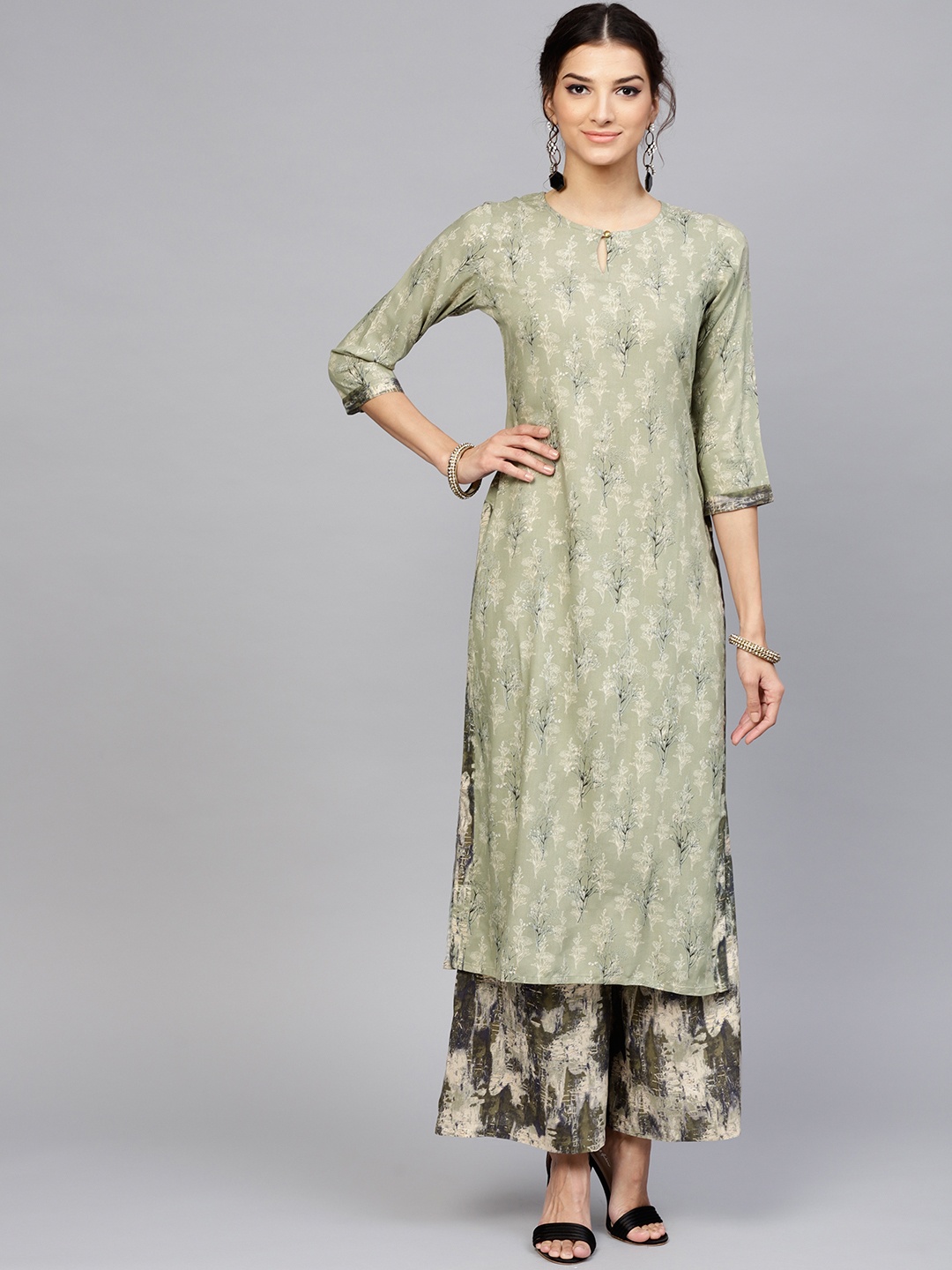 

Libas Women Green Printed Kurta with Palazzos