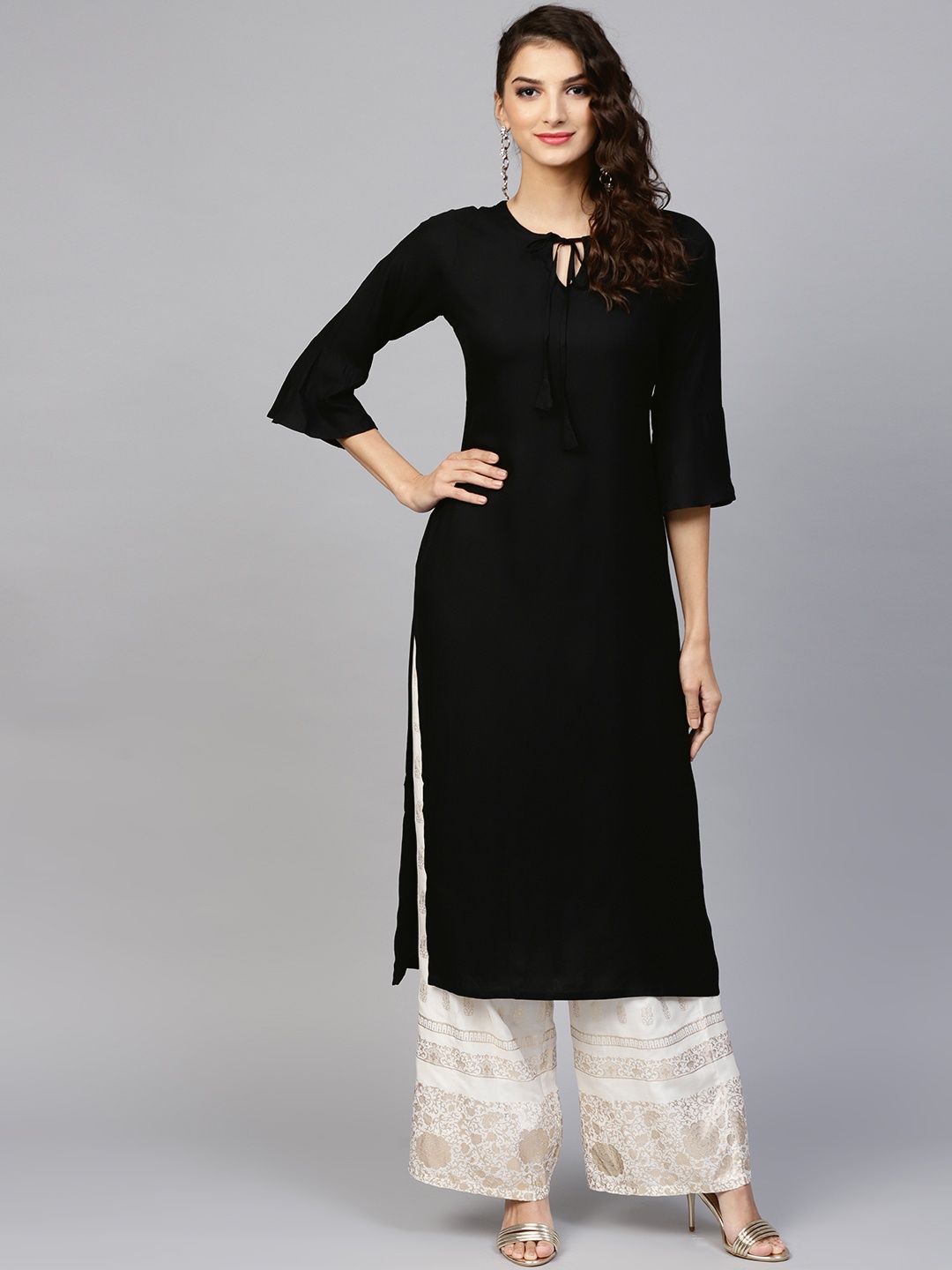 

Libas Women Black Solid Straight Kurta