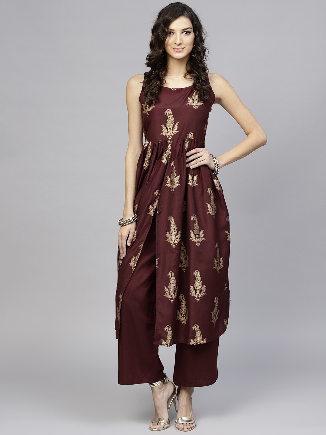 

Libas Women Women Burgundy & Golden Block Print Kurta with Trousers