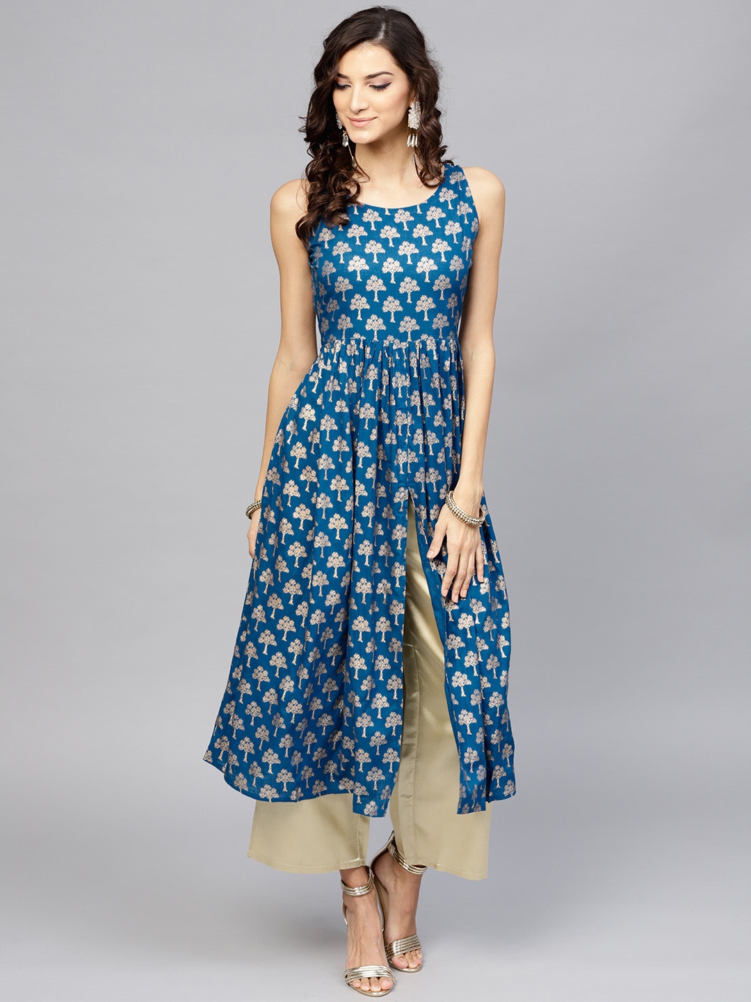 

Libas Women Teal Blue & Golden Block Print Kurta with Palazzos