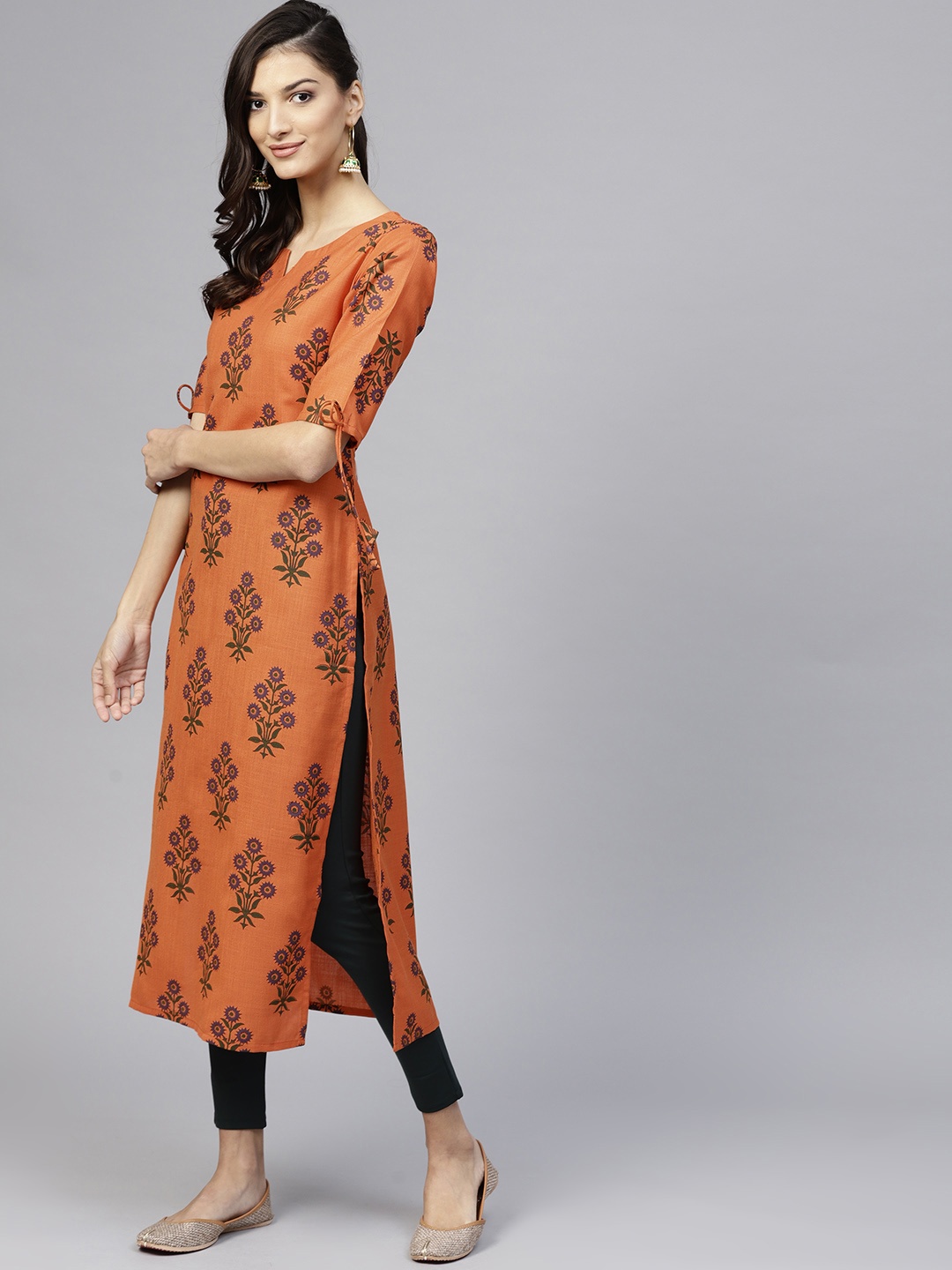 

Libas Women Orange Printed Straight Kurta