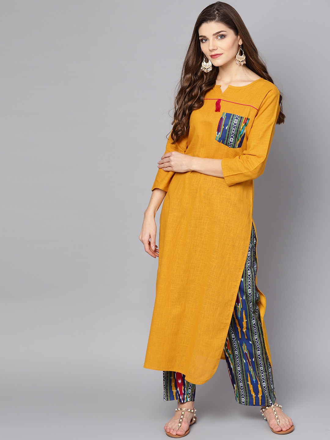 

Nayo Women Mustard Yellow & Navy Blue Solid Kurta with Palazzos