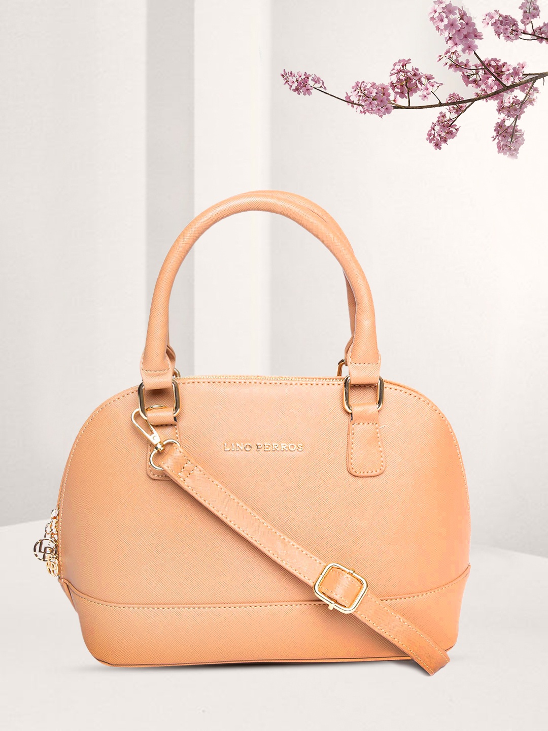 

Lino Perros Beige Solid Handheld Bag