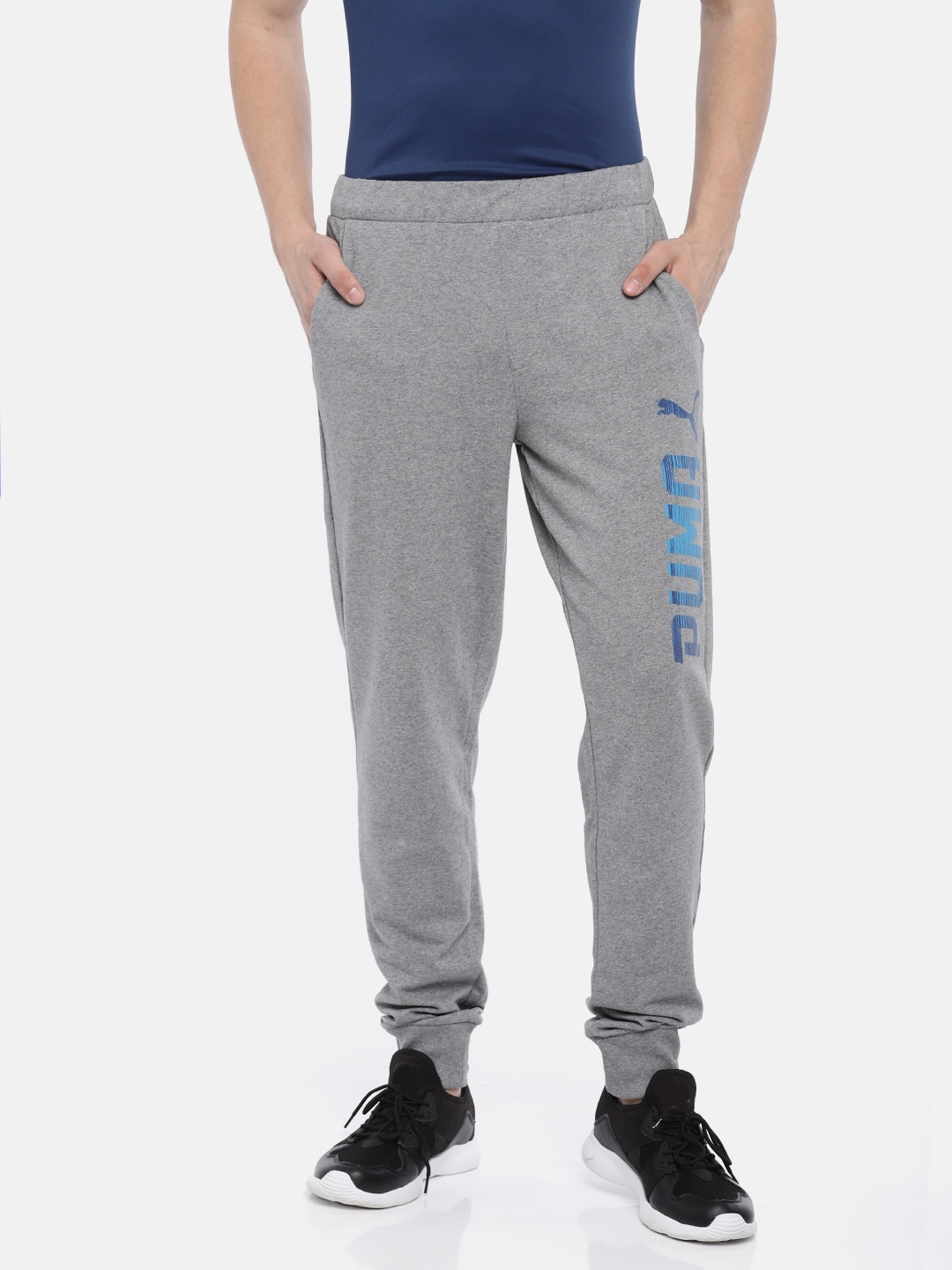 

Puma Men Grey Melange Rebel Sweat Solid Joggers