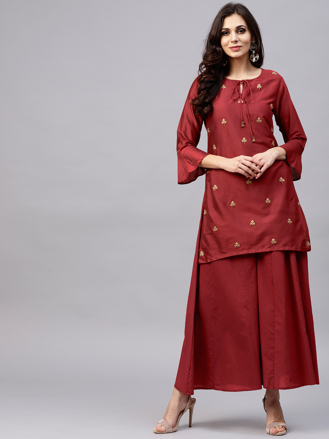 

Bhama Couture Women Maroon Embroidered Kurta with Palazzos