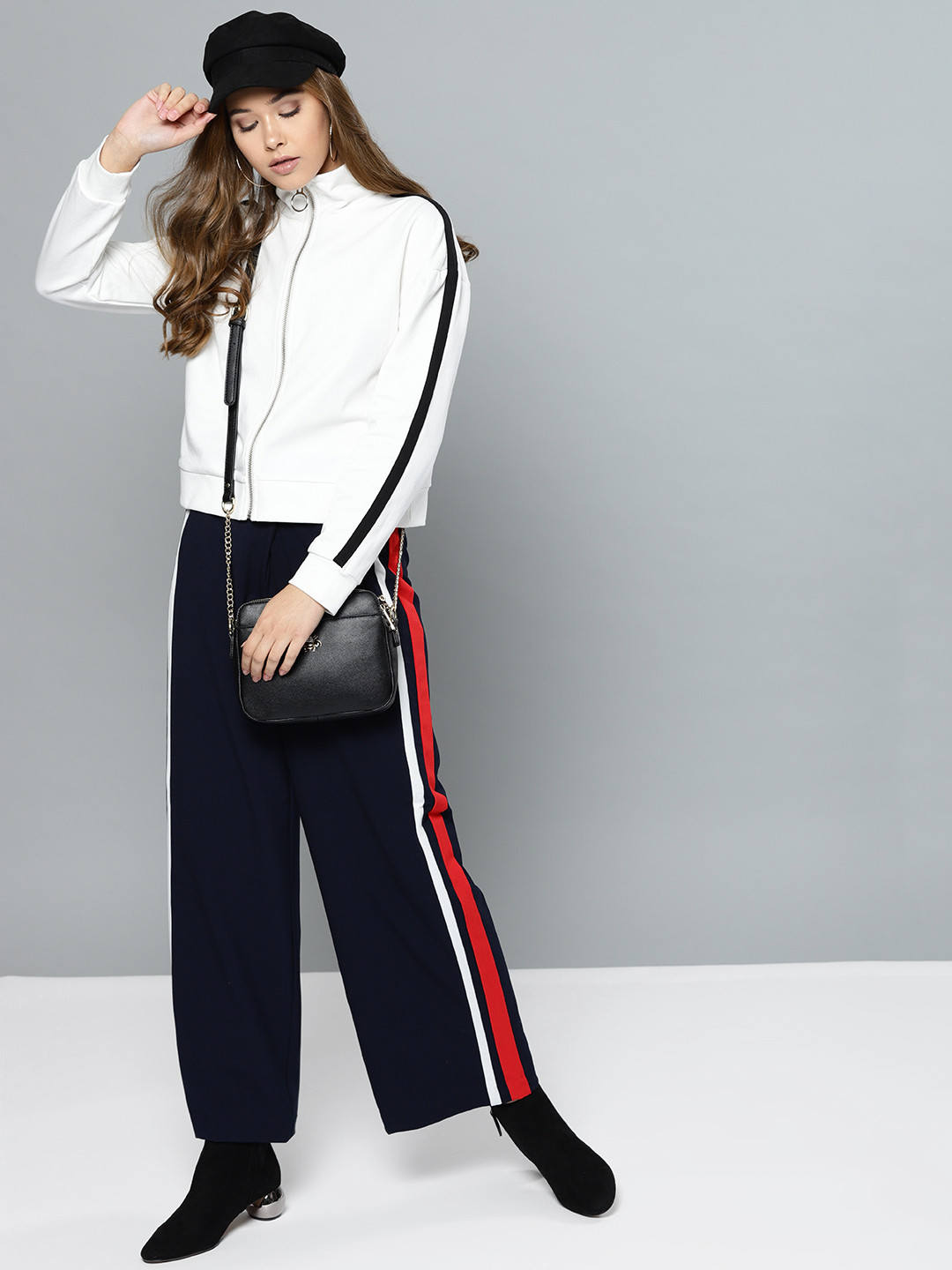 

Harpa Women White Solid Sweatshirt