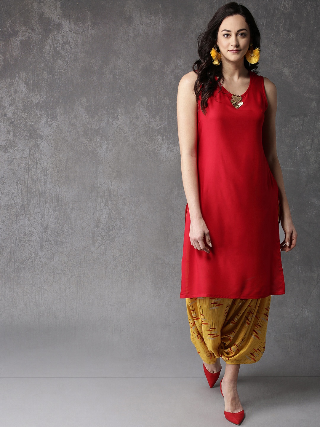

Anouk Women Red & Yellow Solid Kurta with Dhoti Pants