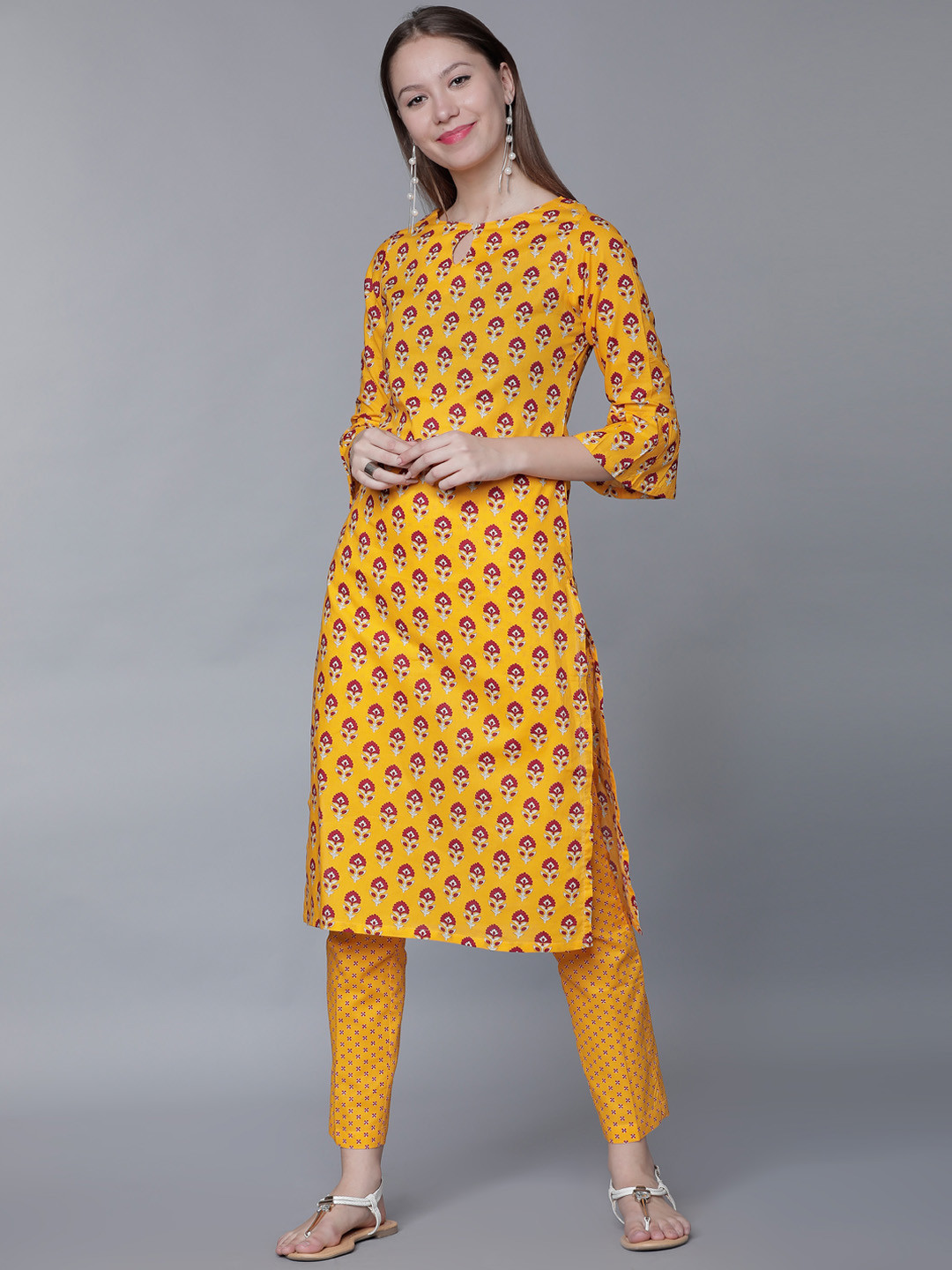 

Vishudh Women Yellow Printed Kurta with Trousers