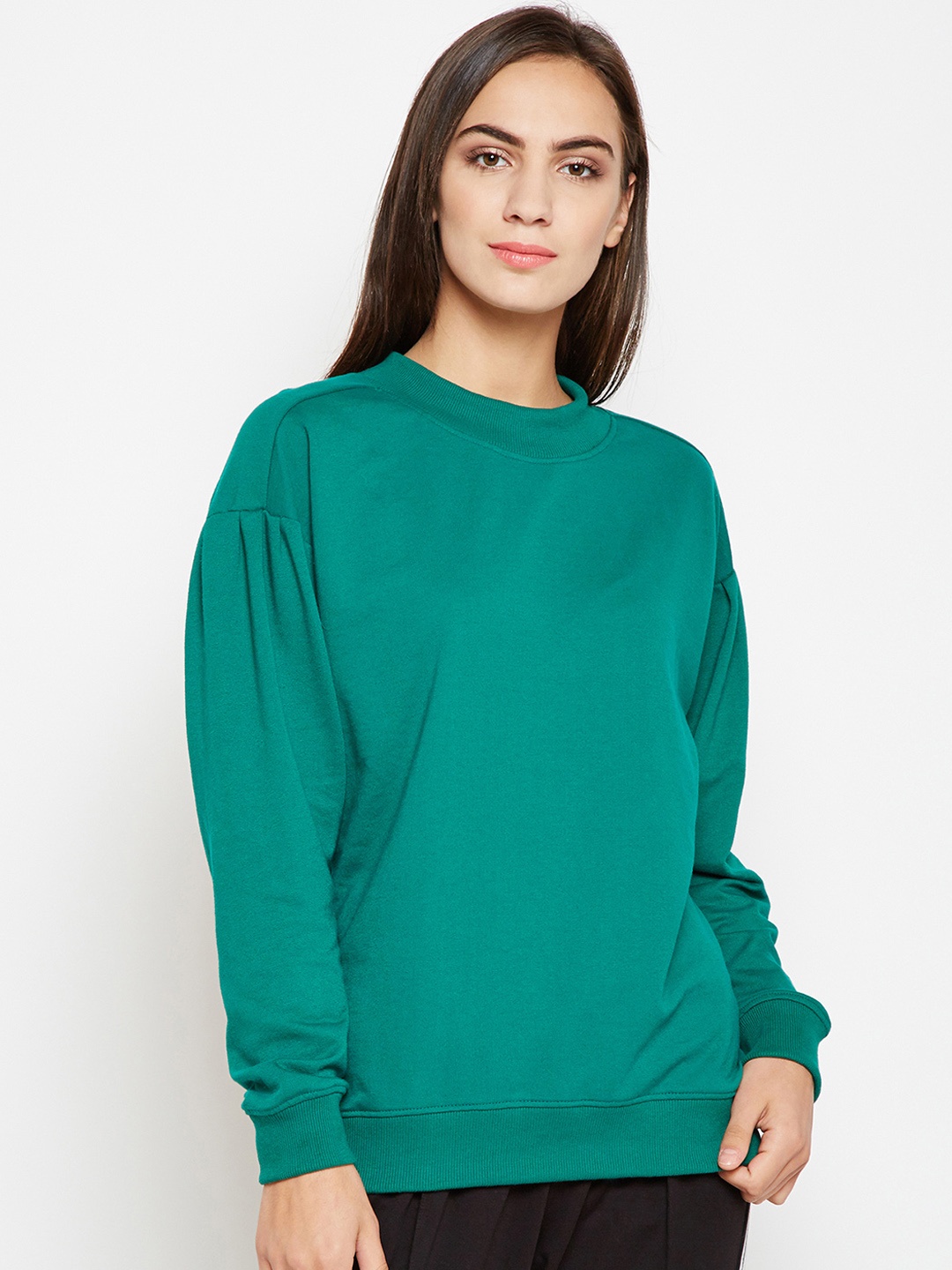 

Nun Women Green Solid Sweatshirt