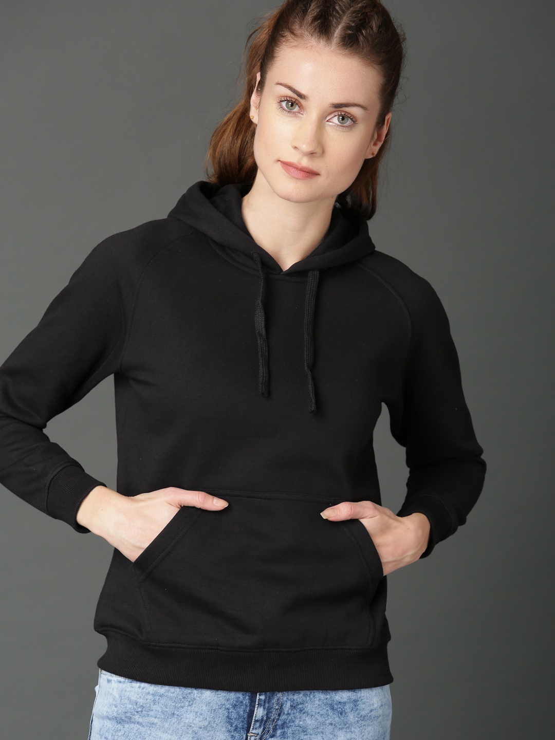 

Roadster Women Black Solid Hooded Sweatshirt