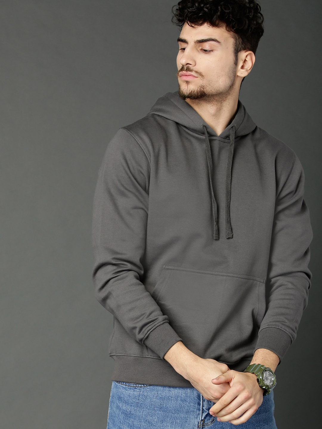 

Roadster Men Charcoal Solid Hooded Sweatshirt