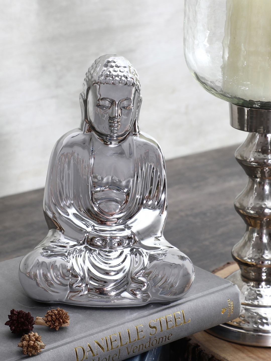 

Pure Home and Living Silver Meditating Buddha Showpiece