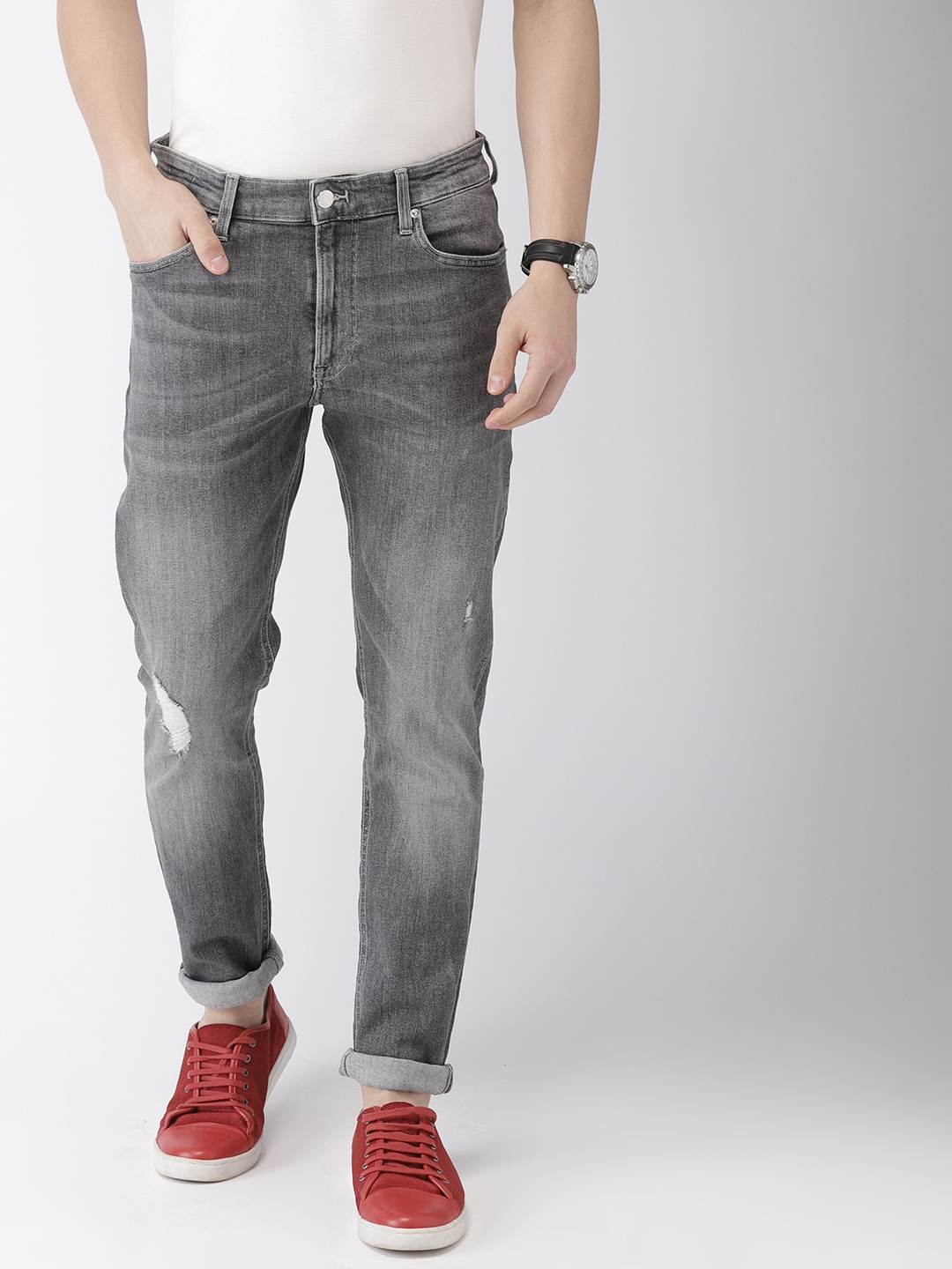 

Tommy Hilfiger Men Grey Skinny Fit Mid-Rise Mildly Distressed Stretchable Jeans