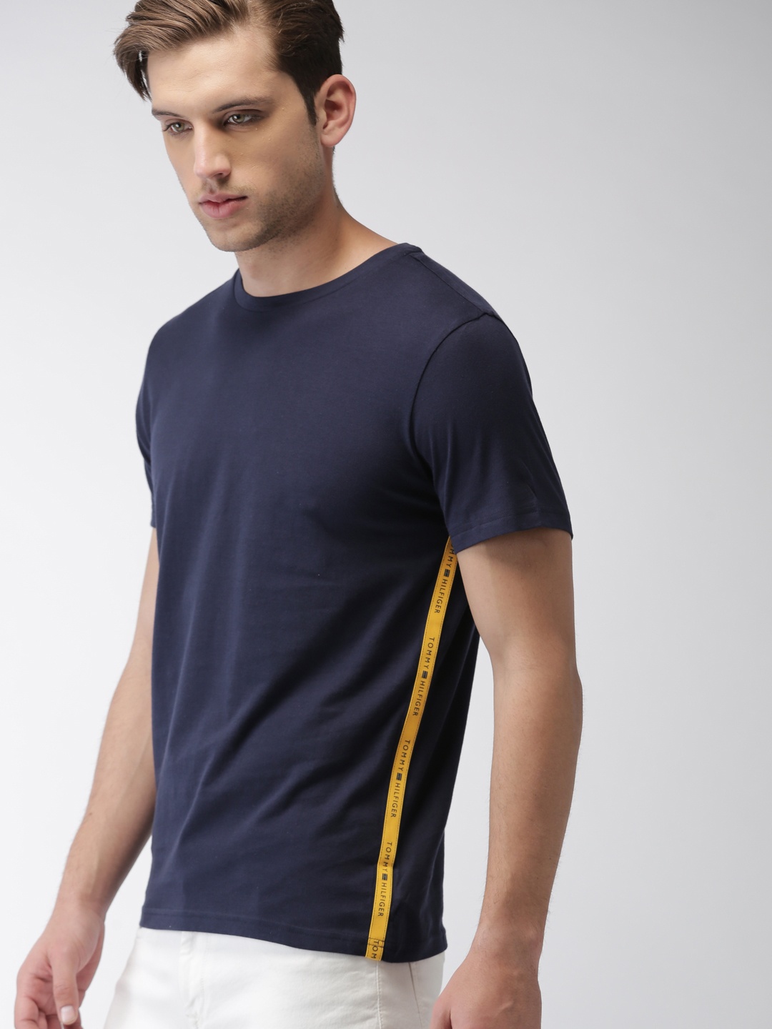 

Tommy Hilfiger Men Navy Blue Solid Round Neck T-shirt