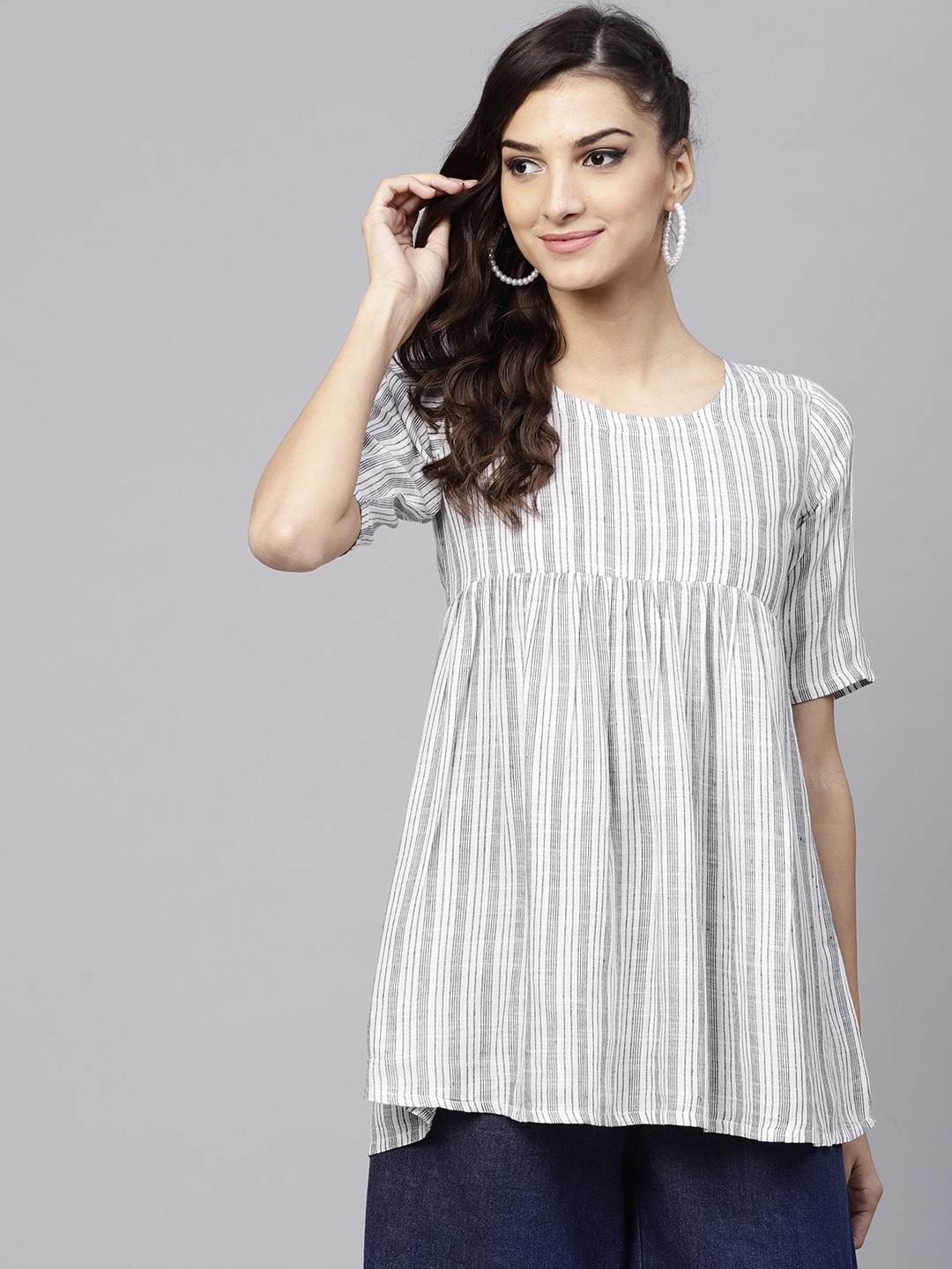 

GERUA Women White & Navy Blue Self Striped A-line Kurti