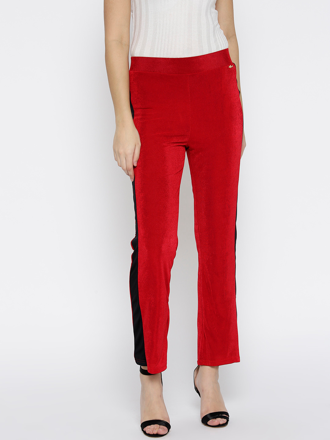 

Ira Soleil Women Red Regular Fit Solid Regular Trousers