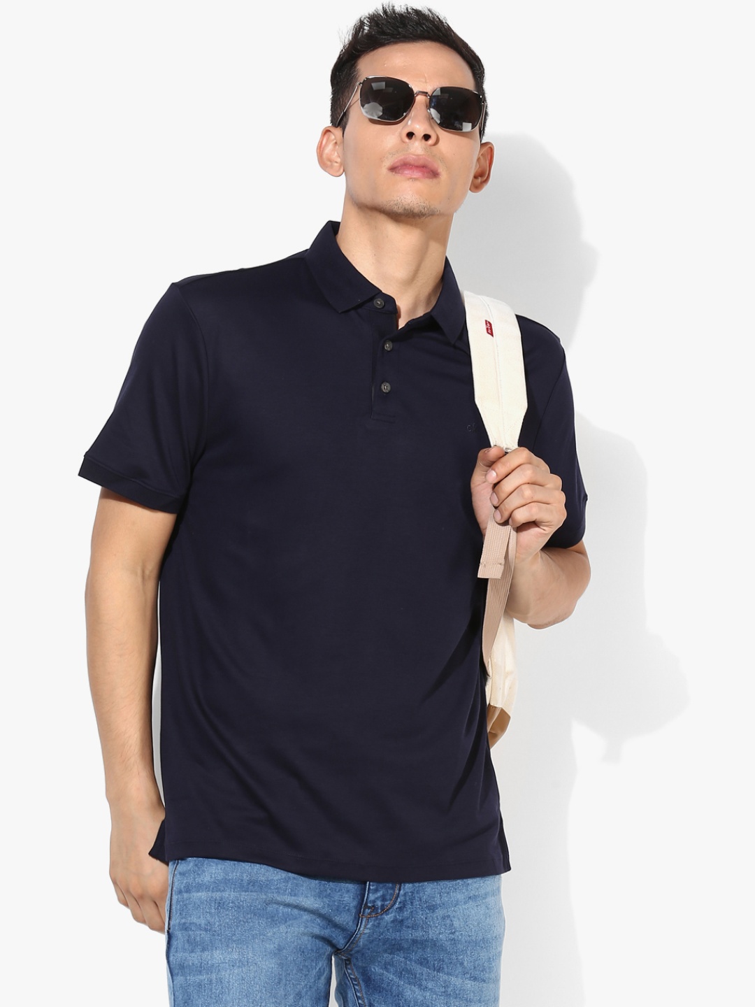 

Calvin Klein Jeans Men Navy Blue Solid Slim Fit Polo T-Shirt