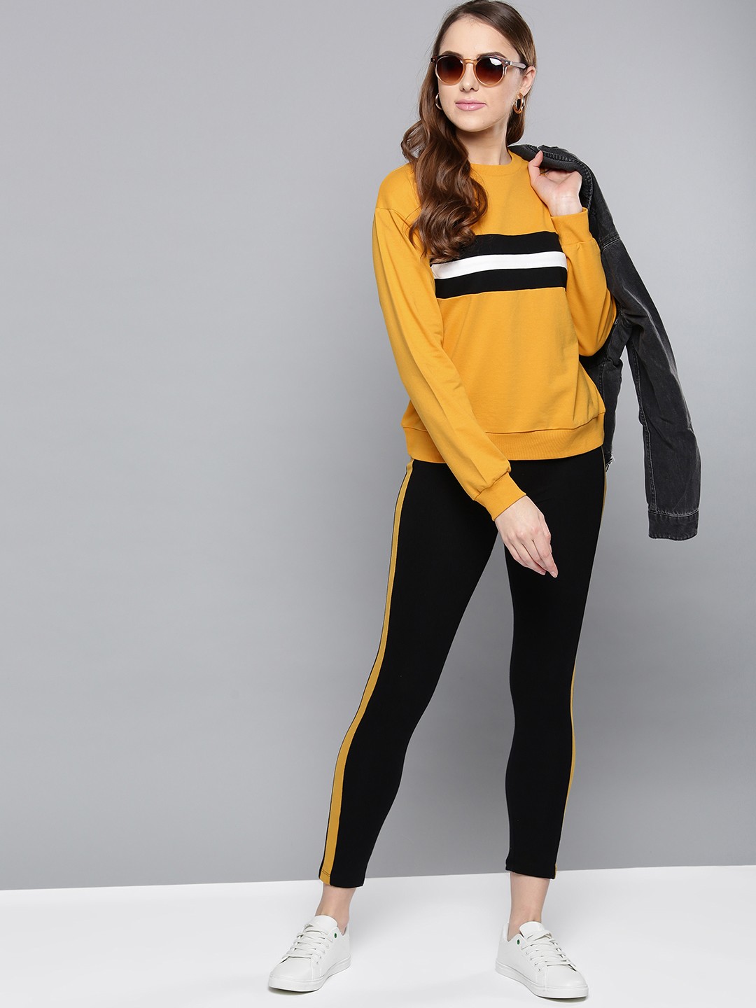 

Harpa Women Mustard Yellow Solid Sweatshirt